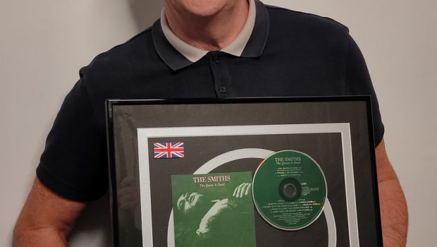 MIKE JOYCE ANNOUNCES RAFFLE OF PLATINUM DISC TO SUPPORT BACK ON TRACK